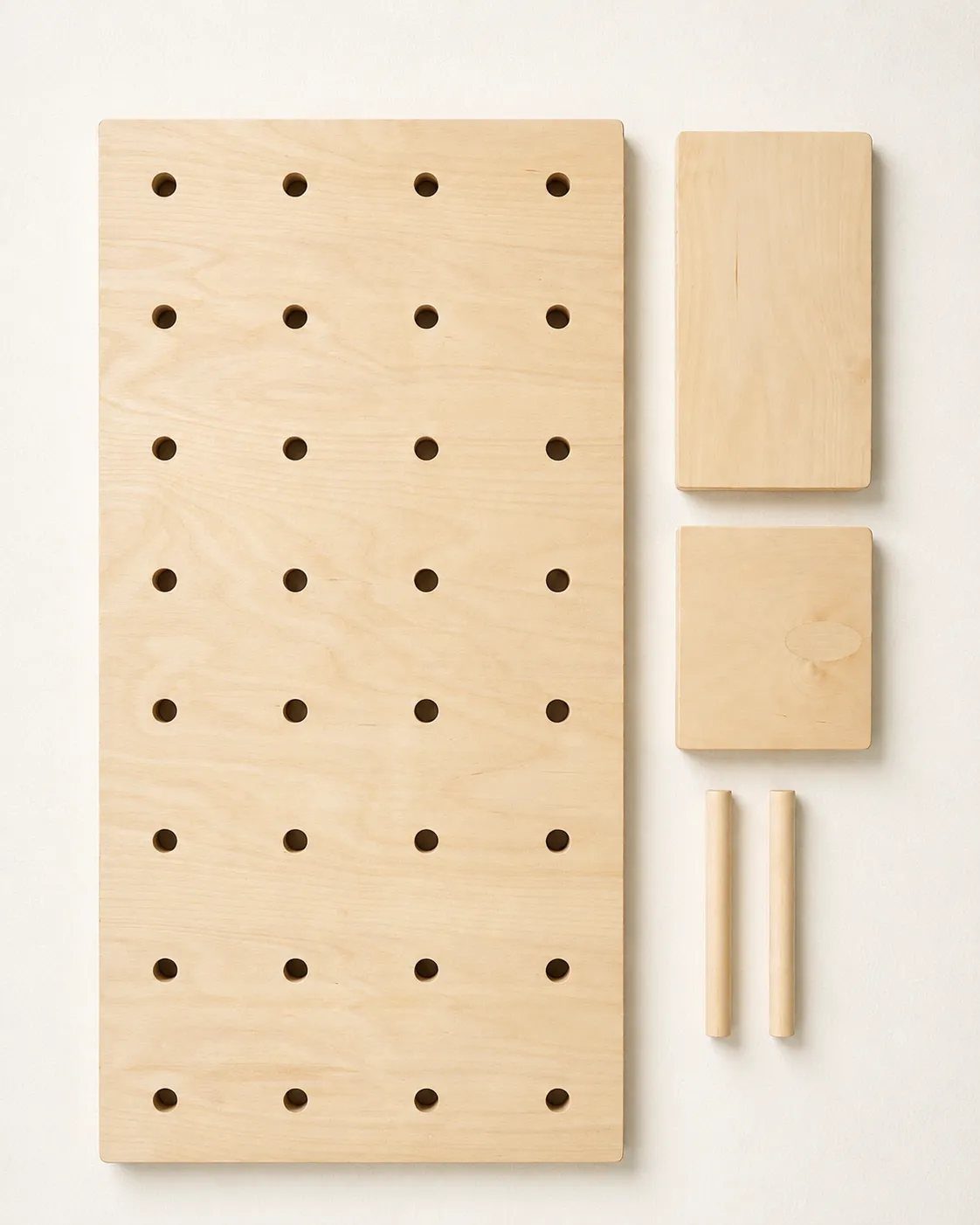 Starter pegboard module, shelves, and pegs arranged to show what is included
