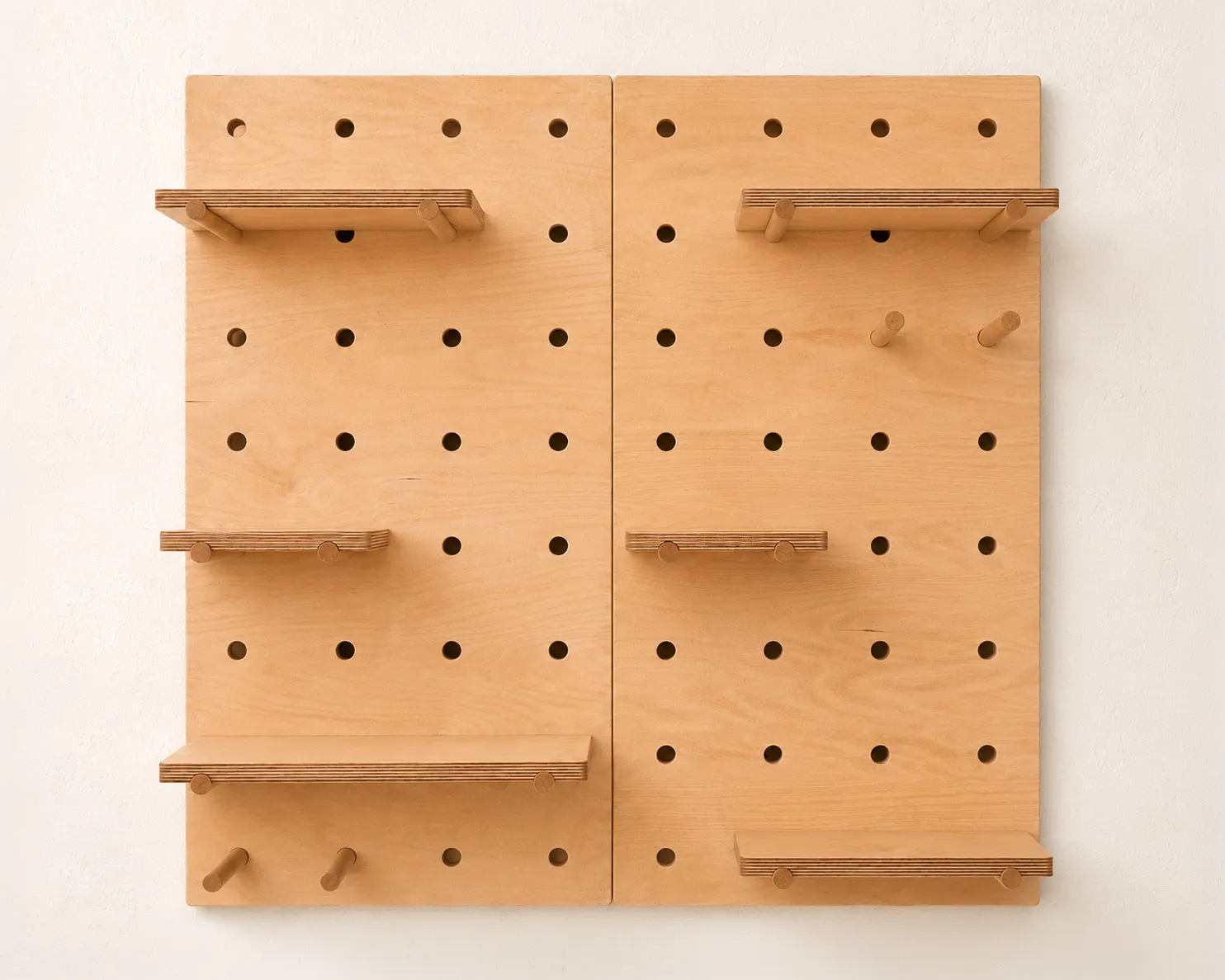 Pair pegboard shown empty with its six shelves and four pegs installed