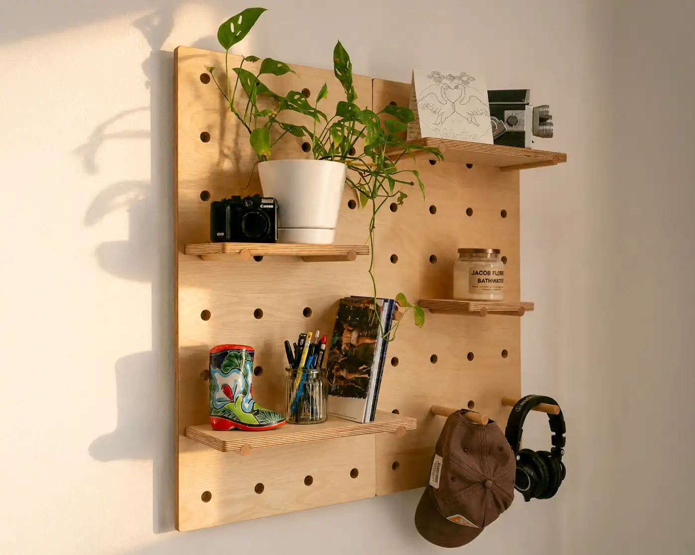 Three-quarter view of the Pair modular wooden pegboard