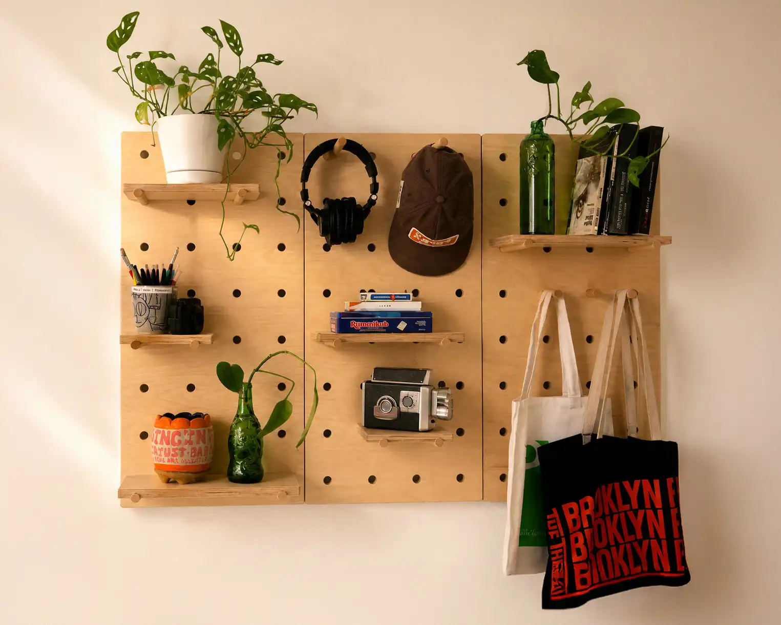 Gallery 1 by 3 modular pegboard installed in warm natural light
